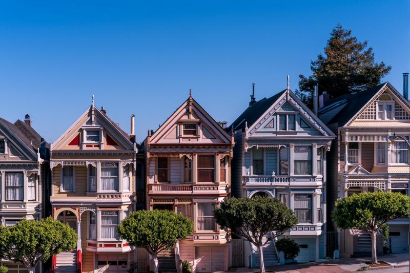 View of colorful Victorian homes in Alamo Square, San Francisco