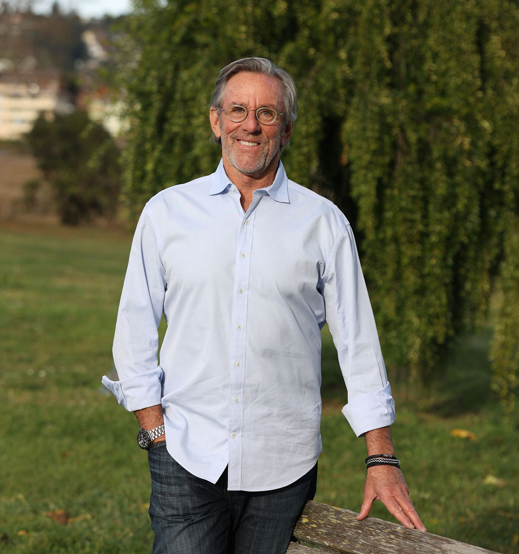 Agent Chris Glave Image of San Francisco and Marin County California real estate agent, Chris Glave standing by a tree smiling
