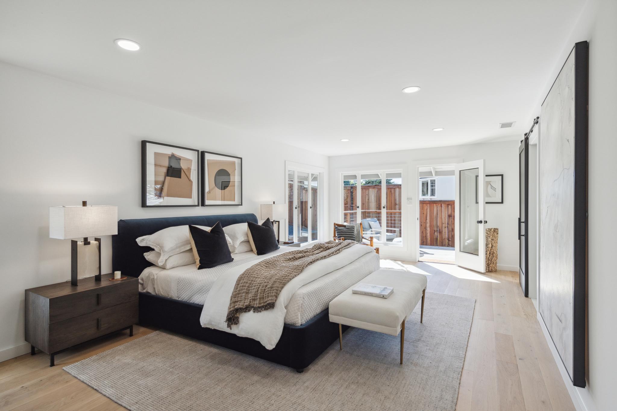 Primary bedroom with wood floors