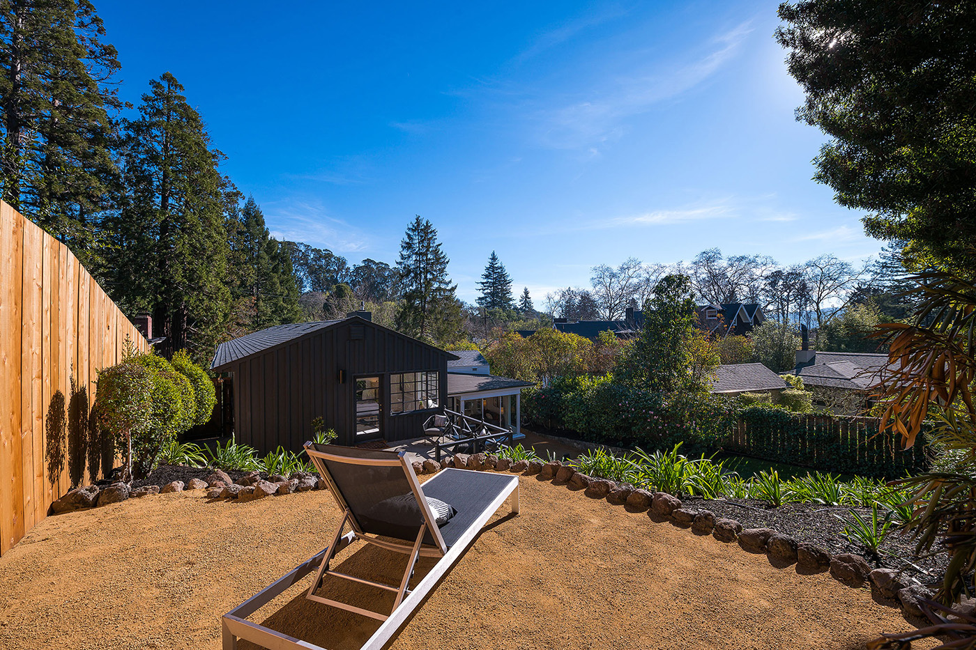 View of the rear yard with tiered outdoor living space at 123 Mountain View Ave represented by Chris Glave