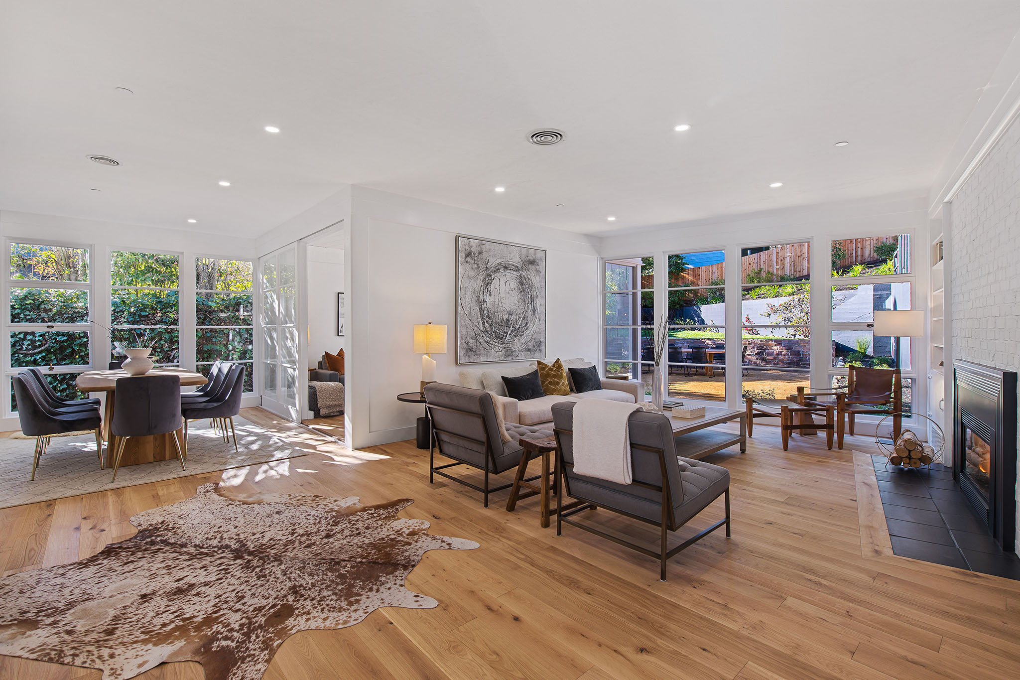 View of the living area, showing a large open floor plan and wood floors