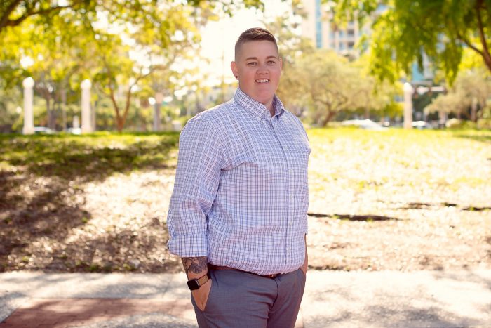 Real estate agent posing for a photo opp.