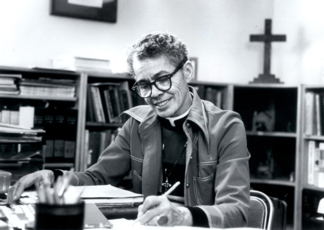 View of Pauli Murray writing at a desk