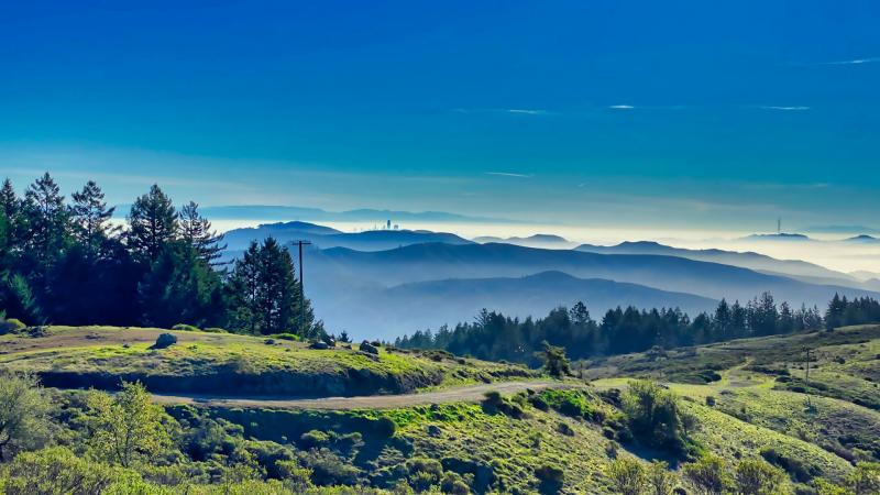 Views of Mt Tam from Mill Valley, showing mountains and blue skies