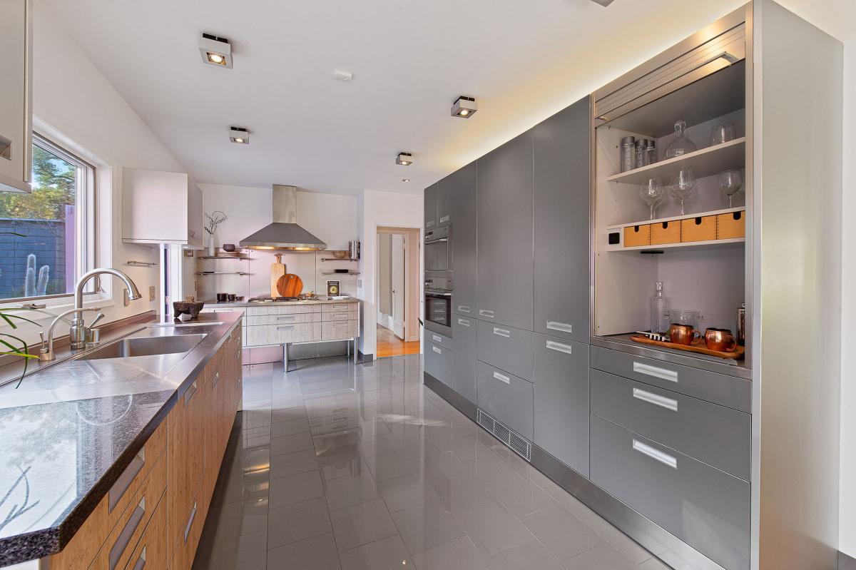 View of the kitchen showing lux appliances and tile floor #11