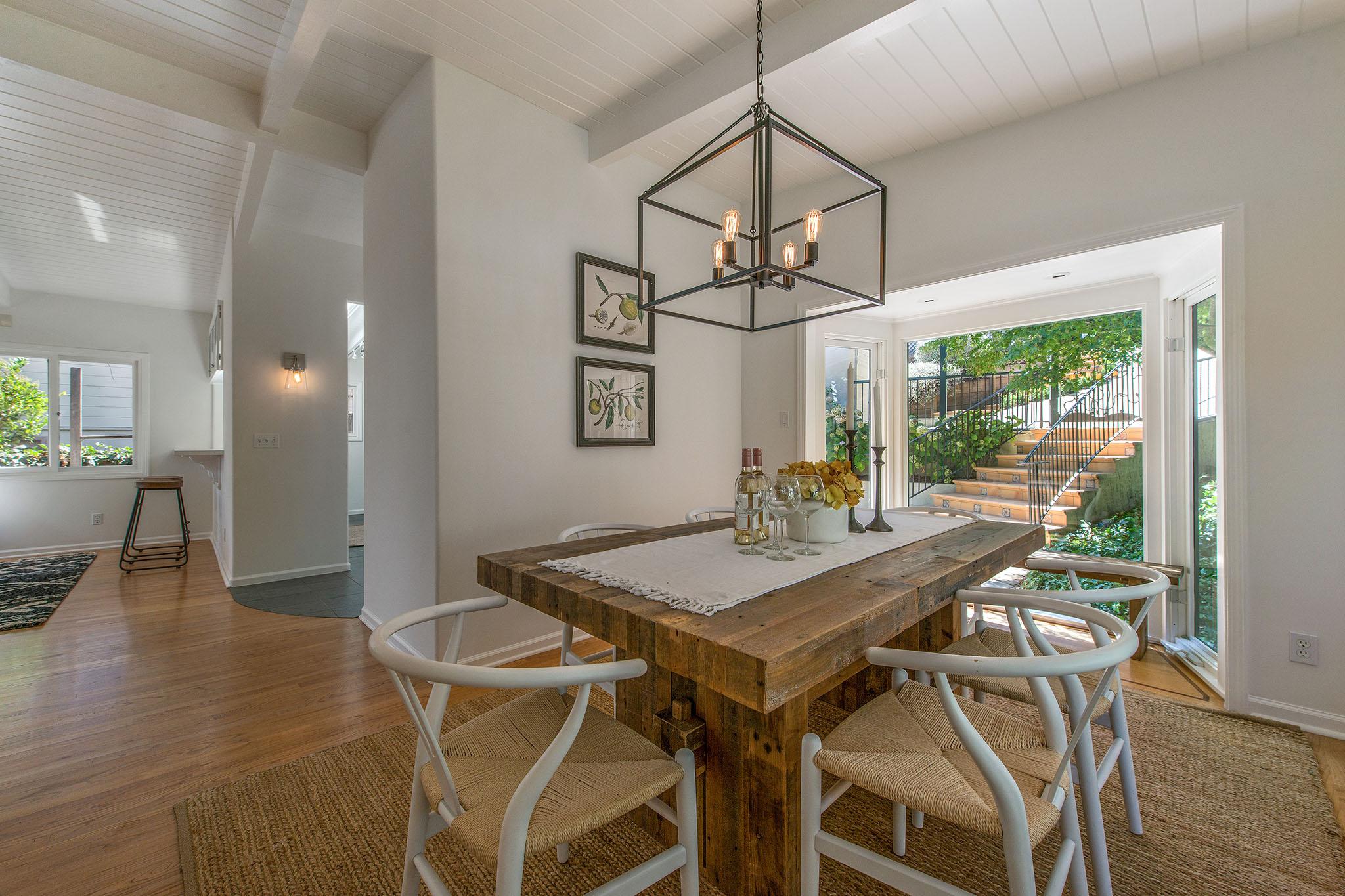 Dining area with views to the outside, also showing wood floors #7