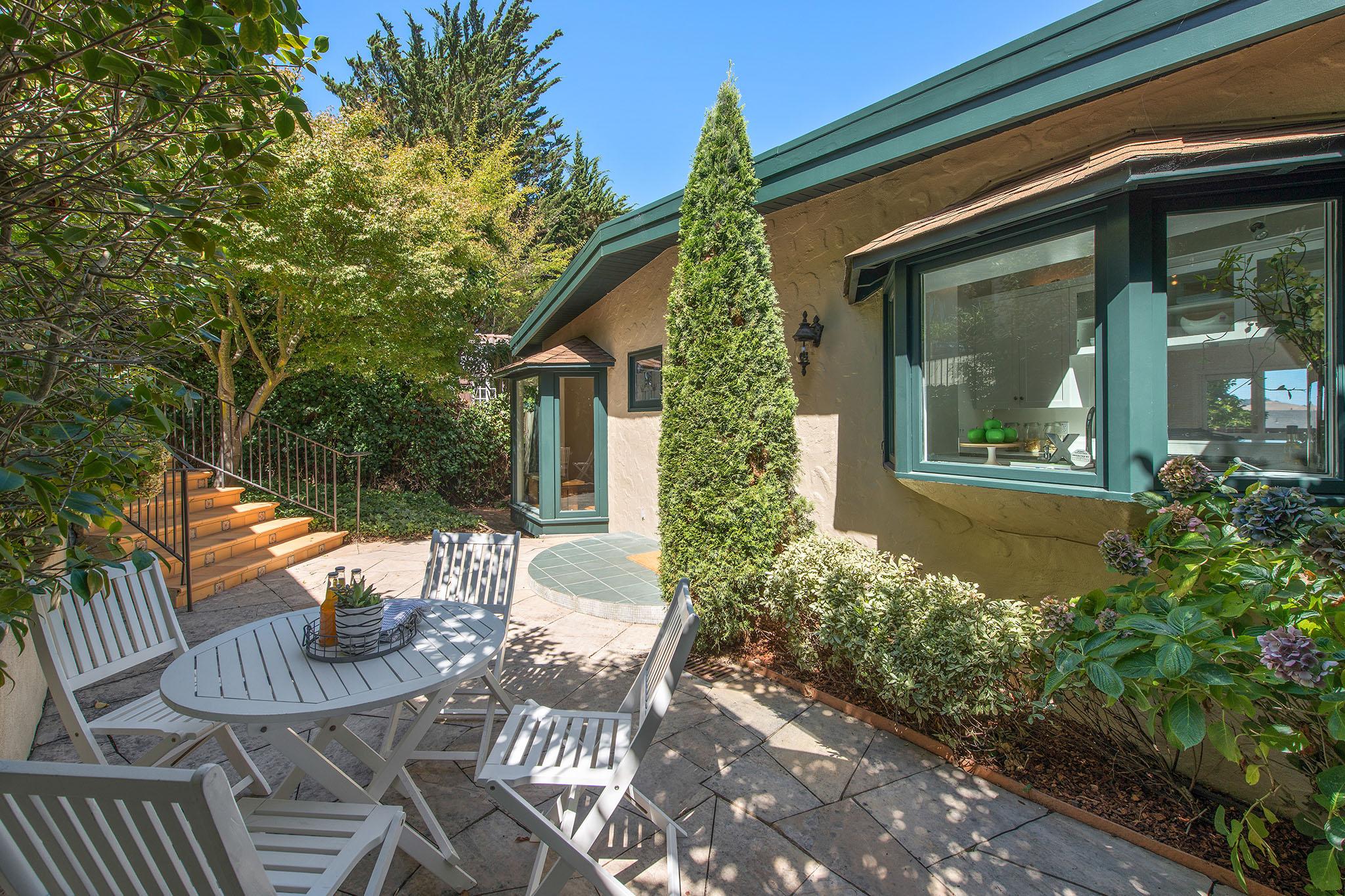 Exterior patio area with pavers #8