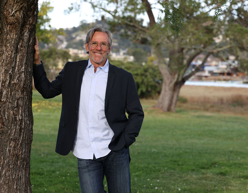 View of Marin County agent Chris Glave standing by a tree
