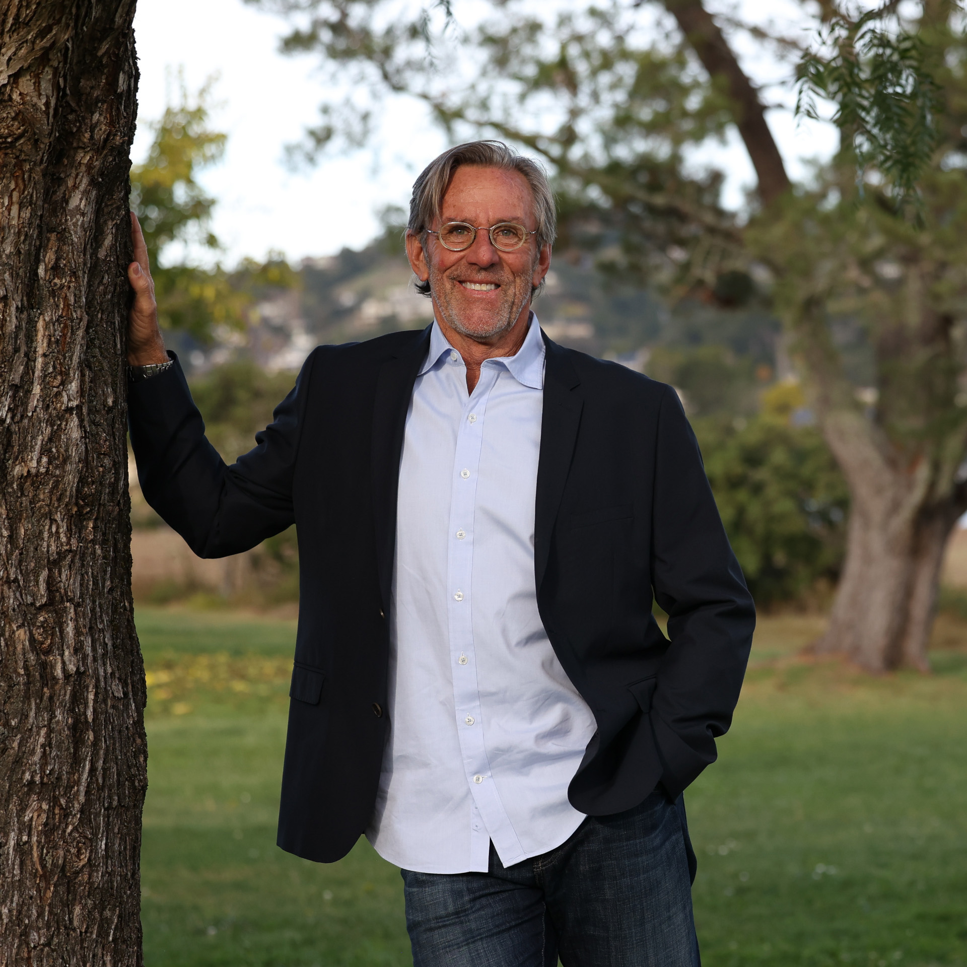 Compass agent, Chris Glave View of Marin County agent Chris Glave standing by a tree